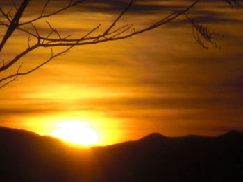 Scenic view of dramatic sky during sunset