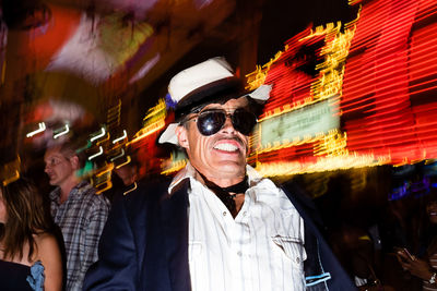 Men in city at night