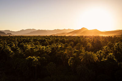 Scenic view of mountains against sky during sunset