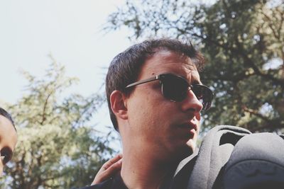 Portrait of young man wearing sunglasses
