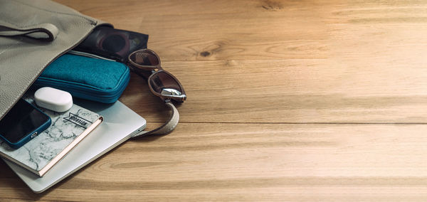 High angle view of personal accessories on table