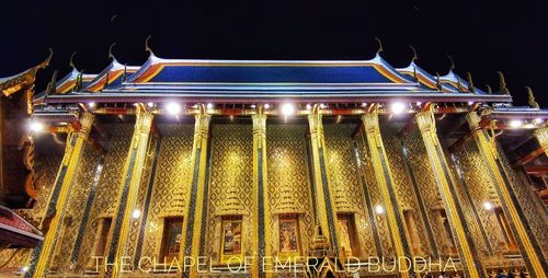 Low angle view of illuminated building at night