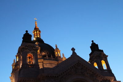 Low angle view of church against blue sky