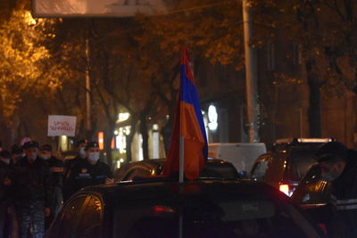 Group of people in the street at night