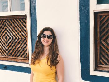 Portrait of young woman in sunglasses