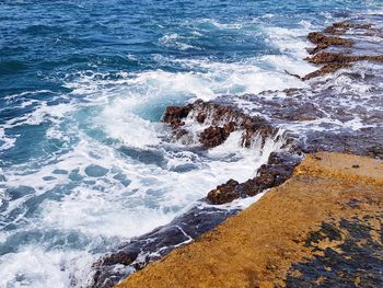 Scenic view of beach against sky