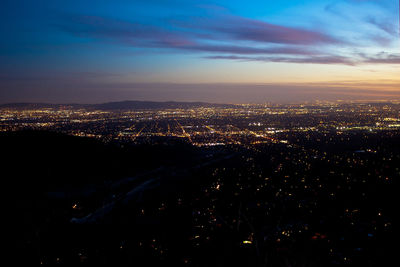 High angle view of illuminated buildings at night