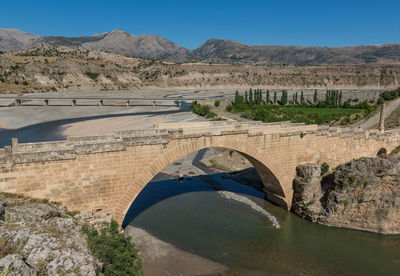 Arch bridge over river