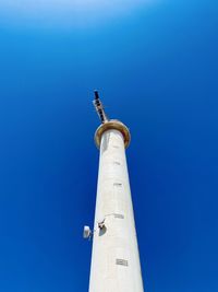 Low angle view of communications tower against clear sky lighthouse in lanzarote