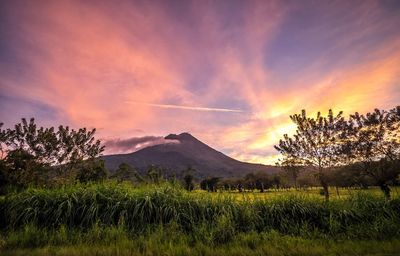 Scenic view of landscape against sky during sunset