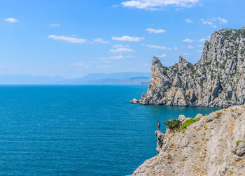 Scenic view of sea against blue sky