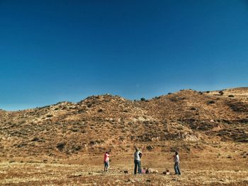 Scenic view of landscape against clear blue sky