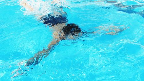 People swimming in pool