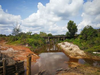 Bridge over water against sky