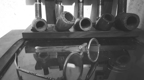 High angle view of old bottles in container