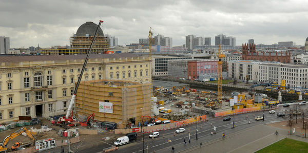 High angle view of buildings in city against sky