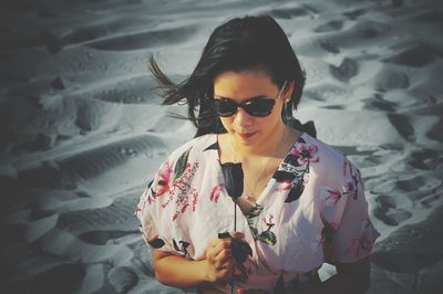 High angle view of woman in sunglasses