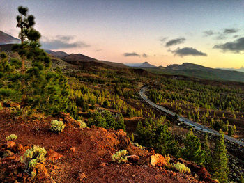 Scenic view of mountains against sky during sunset