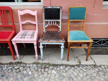 Chairs on sidewalk