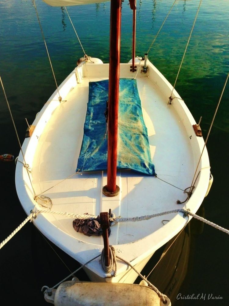 nautical vessel, transportation, mode of transport, boat, water, moored, mast, sailboat, sea, rope, travel, harbor, sailing, part of, air vehicle, fishing boat, cropped, waterfront, day, outdoors