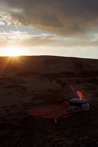 Scenic view of landscape against sky during sunset