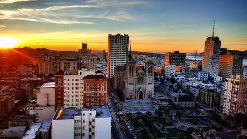 Cityscape against sky during sunset