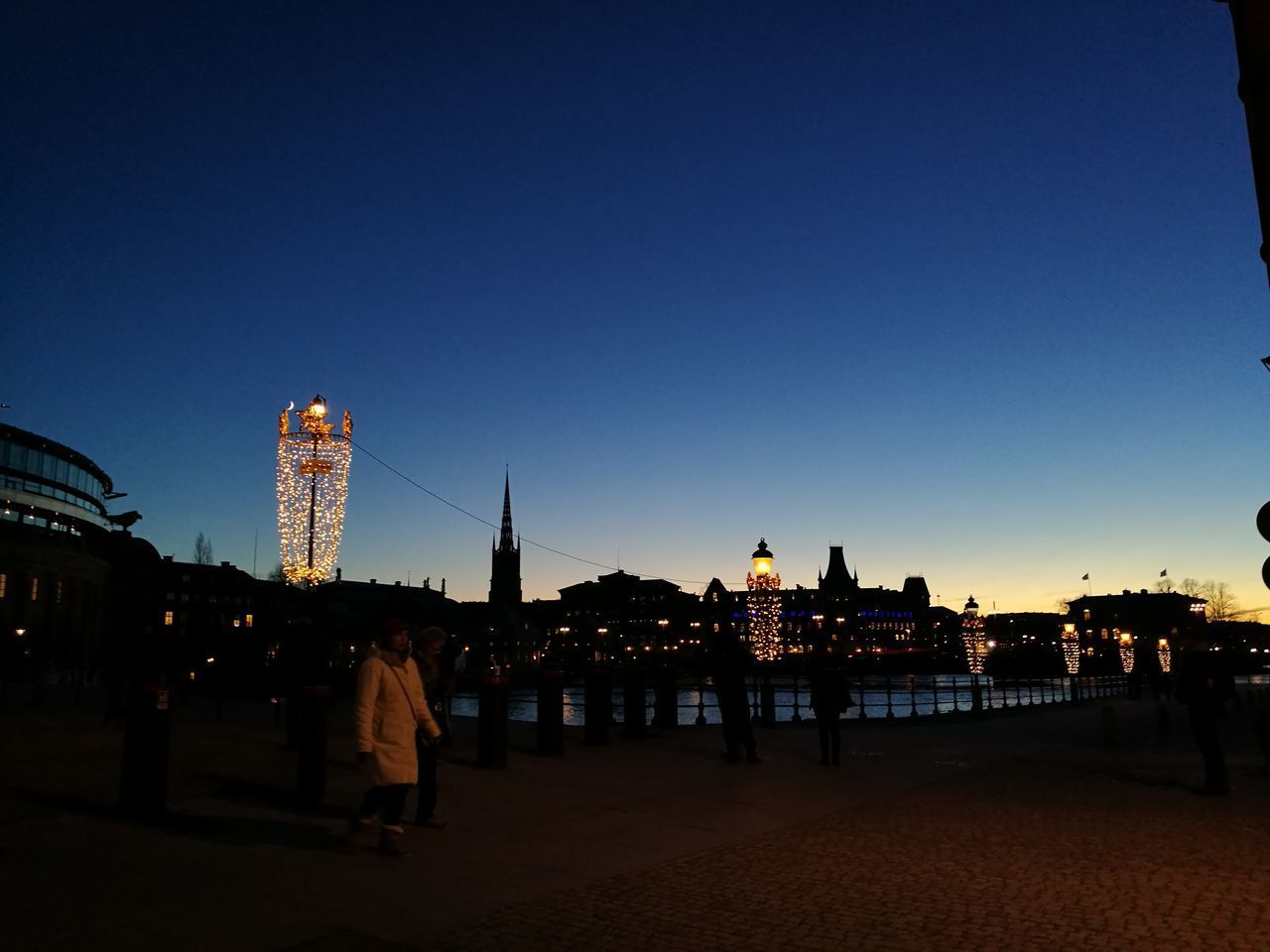 VIEW OF BUILDINGS AT NIGHT