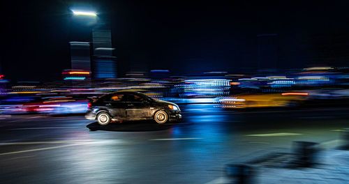 Cars on road at night