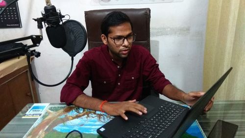 Young man using mobile phone