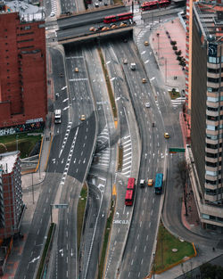 Aerial view of vehicles on road in city