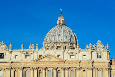 Statue of cathedral against blue sky