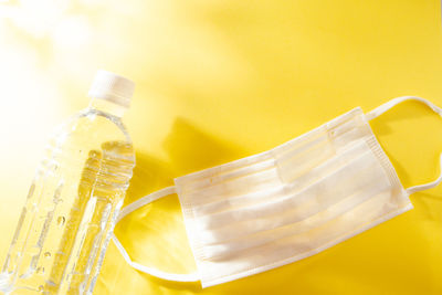 High angle view of bottles on table