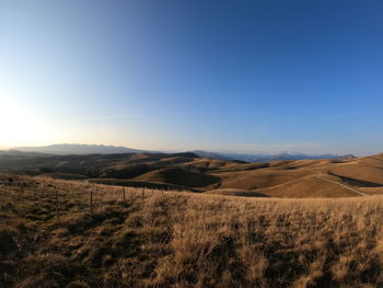 Scenic view of landscape against clear sky