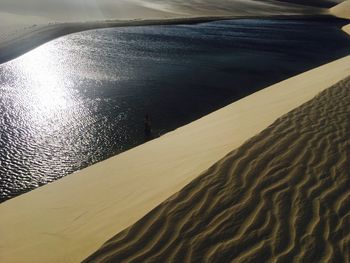 High angle view of sand dunes at beach