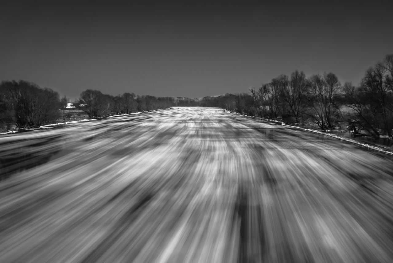 BLURRED MOTION OF ROAD IN WINTER