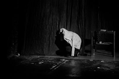 Man on floor at night