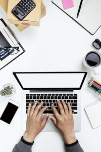 Low section of person working on table