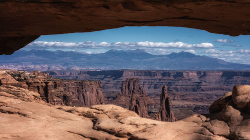 Scenic view of landscape with mountain range in background