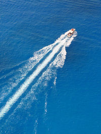 High angle view of wake in sea