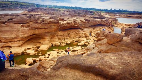 Scenic view of rock formations against sky