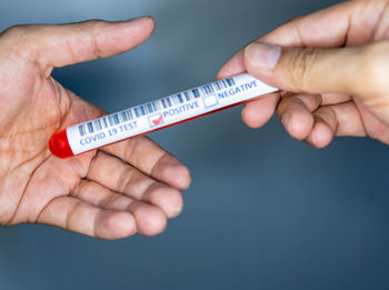 Close-up of person holding hands