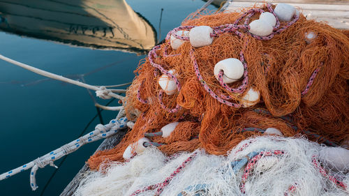 Close-up of fishing net at harbor