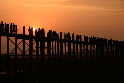 Scenic view of silhouette landscape against sky during sunset