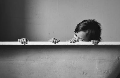 Playful brothers in bathtub at home