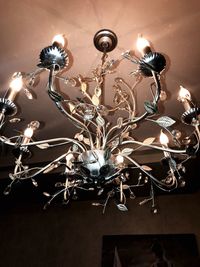 Low angle view of illuminated chandelier