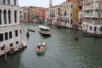 People on boats in canal