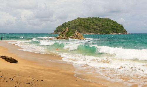 Scenic view of beach against sky