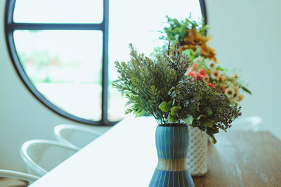 Close-up of vase on table at home