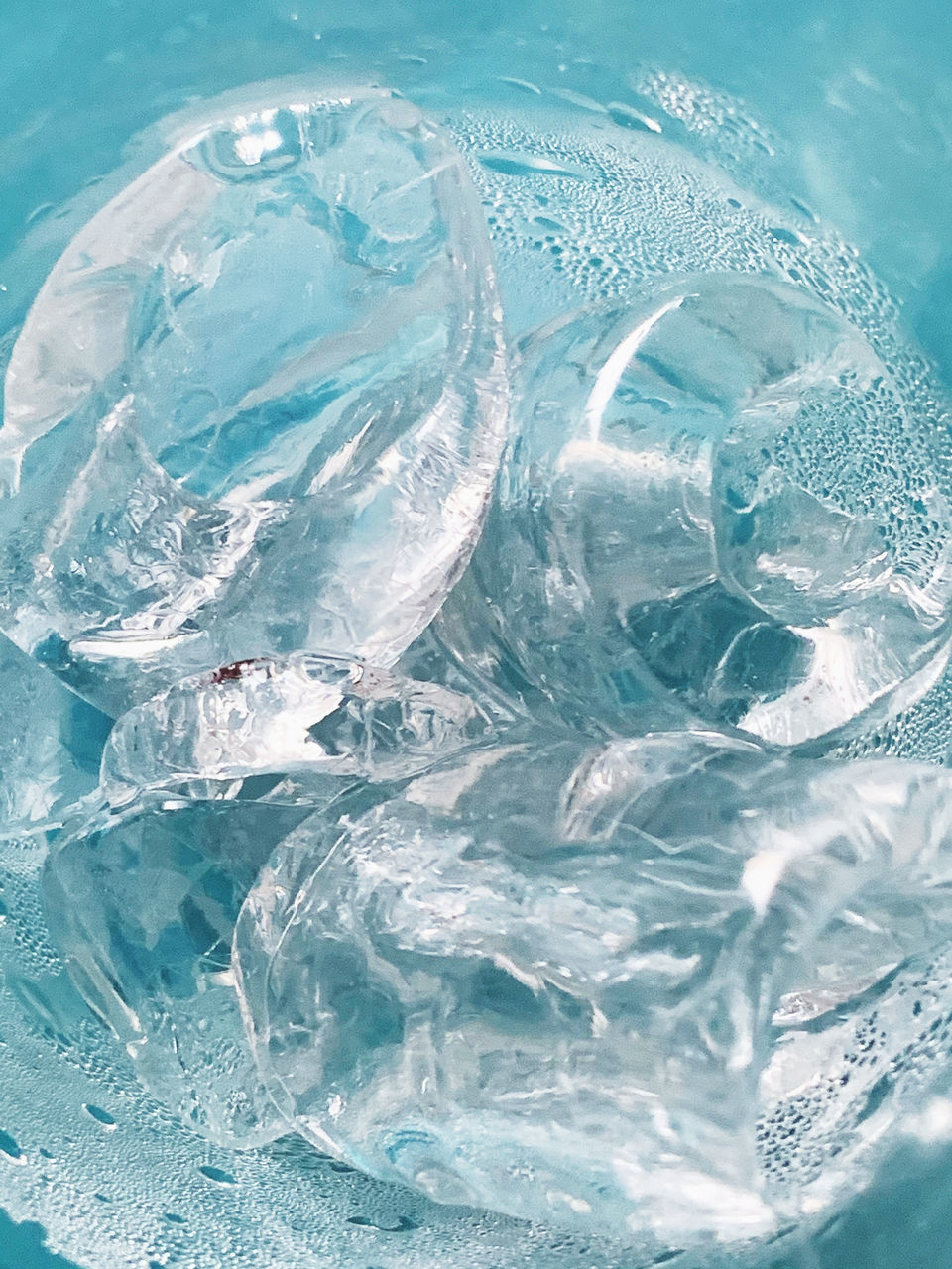 FULL FRAME SHOT OF ICE IN GLASS