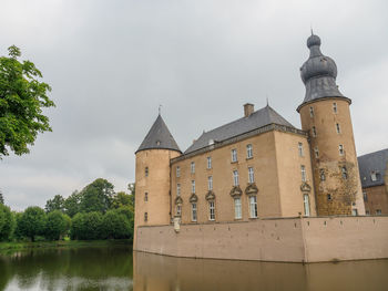 View of building against cloudy sky